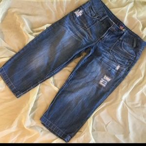 Distressed denim capris